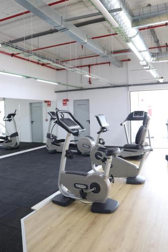 a gym with several exercise bikes in a room at Rivas Futura in Rivas-Vaciamadrid
