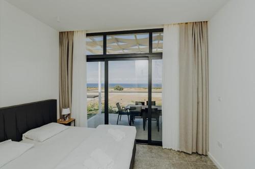 Galería fotográfica de Peaceful Suite Beachfront Getaway en Famagusta