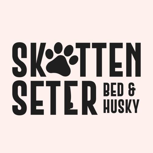 un logo pour une cuisine meilleur lit et un husky dans l'établissement Skotten Seter - Bed & Husky, à Mork