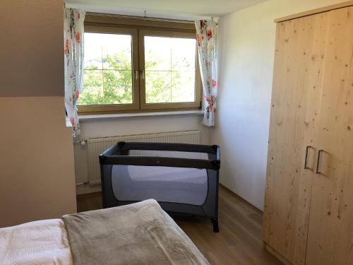 Postel nebo postele na pokoji v ubytování Ferienwohnung Immenberg