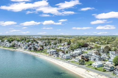 an aerial view of a beach with houses and condos at Beachside in Branford in Stamford