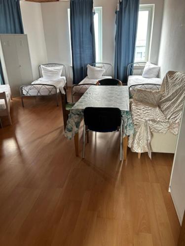 Katil atau katil-katil dalam bilik di Pension Nürnberg