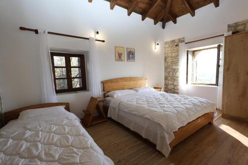 Postel nebo postele na pokoji v ubytování Hera Guest Haus