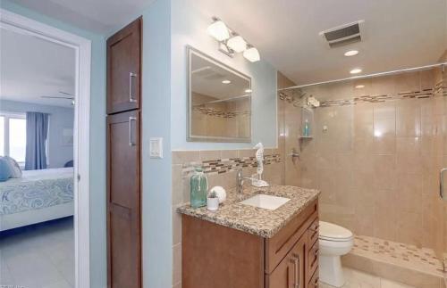 A bathroom at Oceanfront Condo with Pool and Hot Tub!