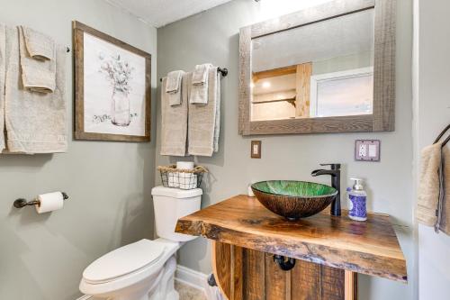 a bathroom with a sink and a toilet at Conesus Apt with Fire Pit, Near Wineries and Lake! in Conesus