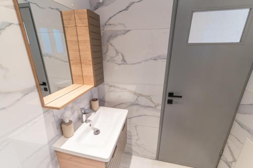 O baie la Island Life Apartment