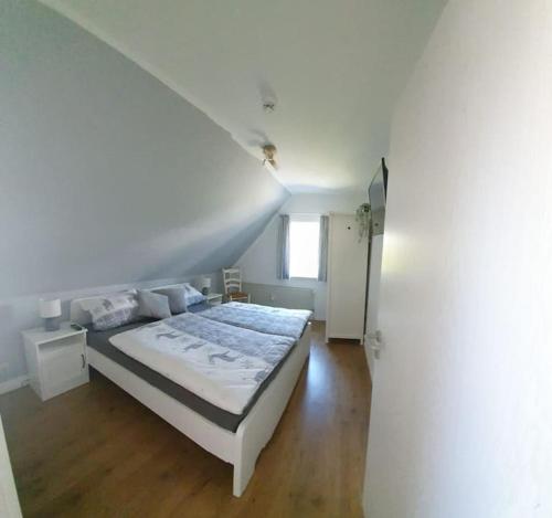 Postel nebo postele na pokoji v ubytování Ferienwohnung Merle in Winterberg-Altastenberg