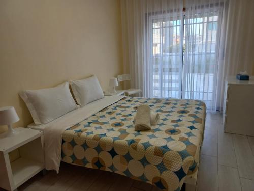 Postel nebo postele na pokoji v ubytování Barra Atlântica Apartment 1