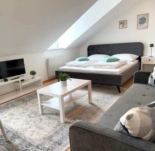Postel nebo postele na pokoji v ubytování Vienna Excellent Apartments