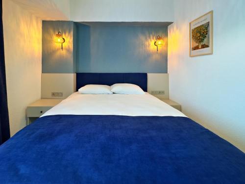 Letto o letti in una camera di Nese Pension