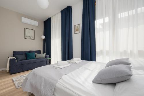 Posteľ alebo postele v izbe v ubytovaní Sarmacka 25 studio 1 close to Medicover and Paley