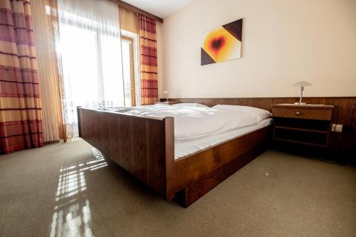Posteľ alebo postele v izbe v ubytovaní Gasthof Schwammer