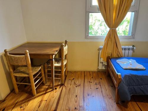 Ένα ή περισσότερα κρεβάτια σε δωμάτιο στο "La Loma" - Vieja Casona
