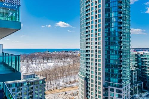 a view of a tall building in a city at Fort York Apartments in Toronto