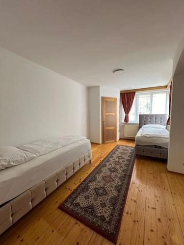Postel nebo postele na pokoji v ubytování Apartment Weisses Lamm