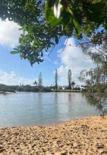 a view of a body of water with trees at Puppies&Pancakes at Innes Park Opp Park&Beach Dogs welcome inside in Pemberton
