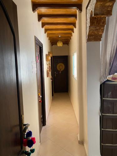 a hallway in a house with a ceiling at Dar El Yacout in Rabat