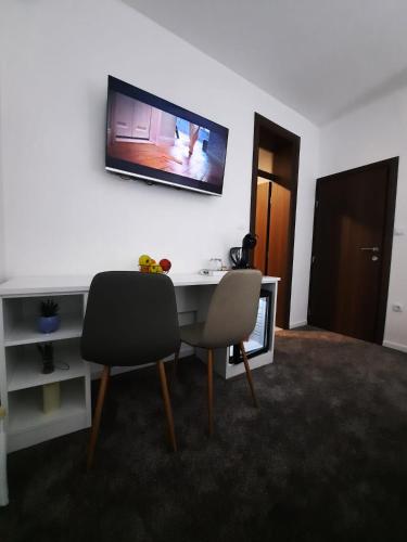 TV a/nebo společenská místnost v ubytování Apartments Miš