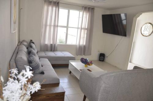 TV a/nebo společenská místnost v ubytování Increible Casa Céntrica con Alberca Climatizada