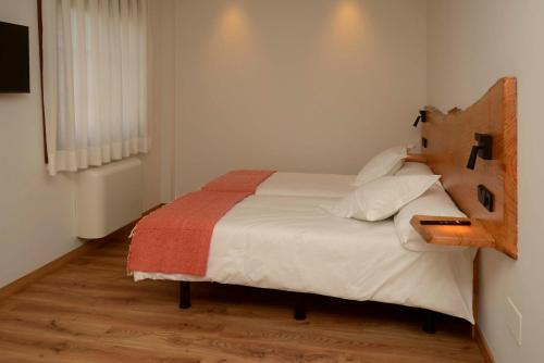 Letto o letti in una camera di A Reigada Hotel Restaurante