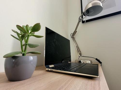 Μια τηλεόραση ή/και κέντρο ψυχαγωγίας στο Dynastie 21 - Appartement 4 personnes Dijon Centre