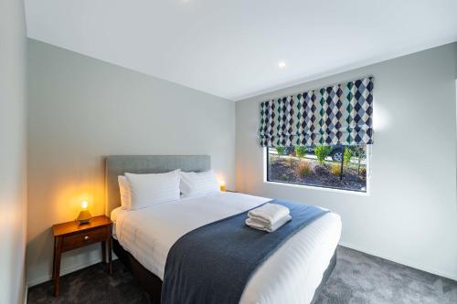 Postel nebo postele na pokoji v ubytování Cosy Kirimoko Escape