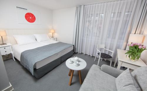 Giường trong phòng chung tại Villa Polanica