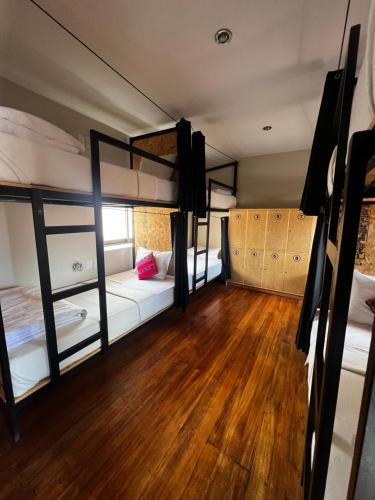 Cama o camas de una habitación en Xplora Hostel Cusco