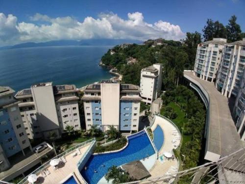 an aerial view of a resort and the ocean at Porto Real Resorts - Apartamento com Vista in Mangaratiba