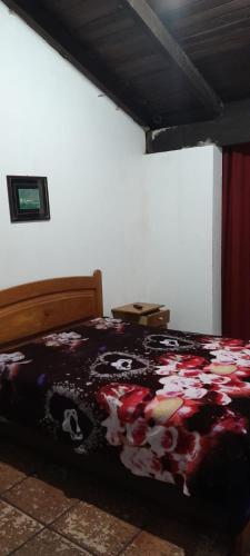 En eller flere senger på et rom på Pousada Solar das Torres