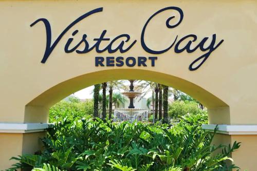 a sign for the vista way resort at Lion King-themed condo near Disney, Sea World, Universal and OCCC with pool, spa, restaurants, shuttle, private balcony, and the BEST view of fireworks shows in Orlando