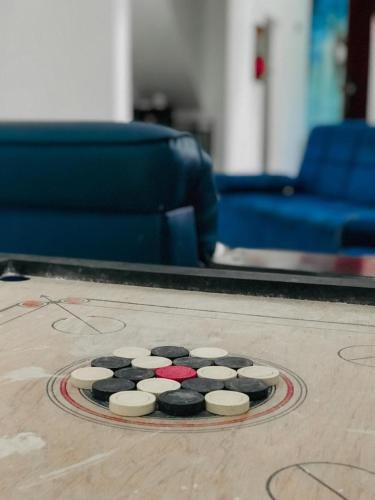 a circle of cookies on the floor in a living room at Desire Village Rakwana in Rakwana