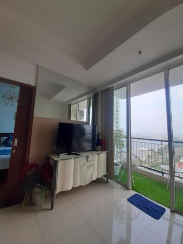 Μια τηλεόραση ή/και κέντρο ψυχαγωγίας στο Ancol mansion apartement