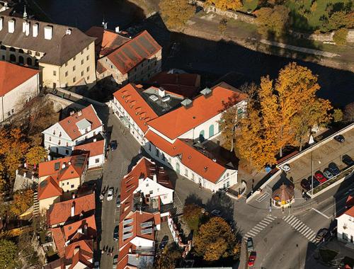 an overhead view of a city with buildings and a street at Hotel Barbakan in Český Krumlov