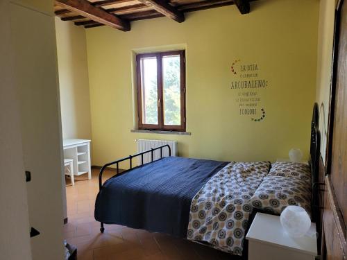 Katil atau katil-katil dalam bilik di Agriturismo Merlino