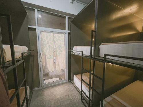 Postel nebo postele na pokoji v ubytování De Coco Hostel Koh Tao