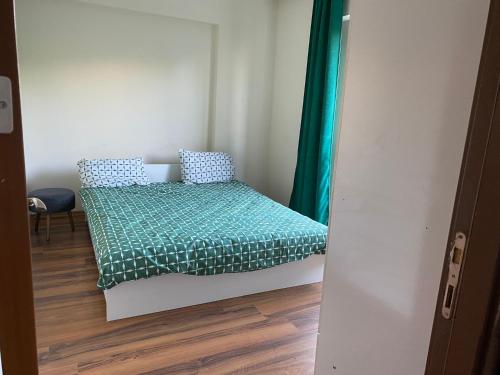 Ένα ή περισσότερα κρεβάτια σε δωμάτιο στο DLK Deluxe Suit