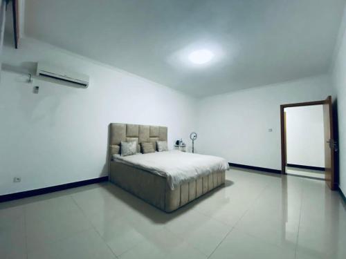 Säng eller sängar i ett rum på Appartement Meublé haut standing