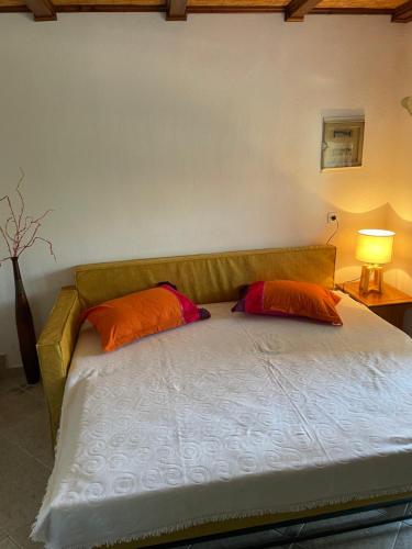 Ένα ή περισσότερα κρεβάτια σε δωμάτιο στο Lila's Guest House