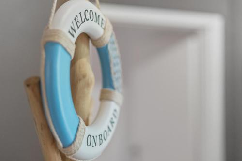 a bracelet that reads one lifelong at Bootshaus-Suite in Überlingen