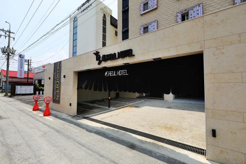 a building that is under construction on a street at Gaeul Hotel in Chungju
