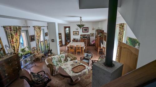 Χώρος καθιστικού στο Chambre d'Hôtes La Grenade Bleue