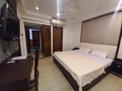Katil atau katil-katil dalam bilik di Hotel Sagar