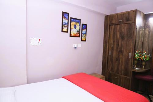 Ένα ή περισσότερα κρεβάτια σε δωμάτιο στο Sikaria Homes
