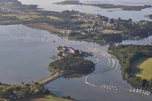 an aerial view of a lake with a bunch of boats at Maison de tourisme Conleau in Vannes