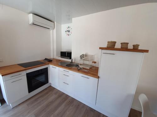 Photo de la galerie de l'établissement Triplex avec terrasse en rooftop, au coeur de Sete, à Sète