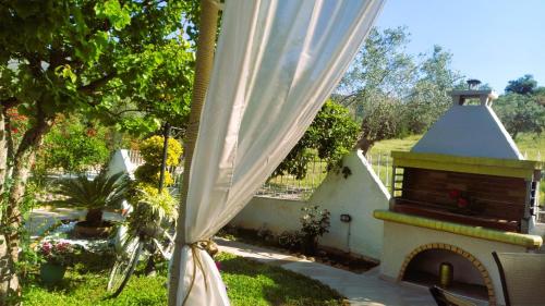 a view from a window of a house with a fireplace at Amalia's Maisonette in Marathos