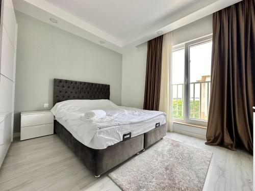 Postel nebo postele na pokoji v ubytování Double Studio A505 StayInn by Cosmopolis