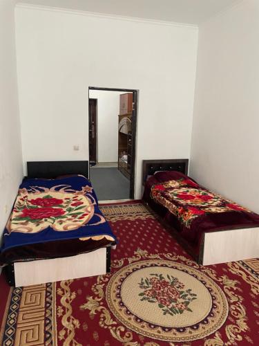 Säng eller sängar i ett rum på Avezovs flat