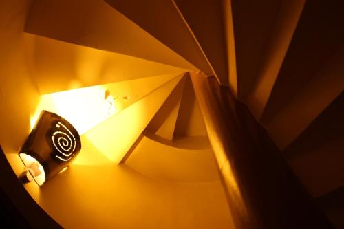 a close up of a lamp with a light on it at Rezidence Zámeček - Boutique Hotel in Františkovy Lázně